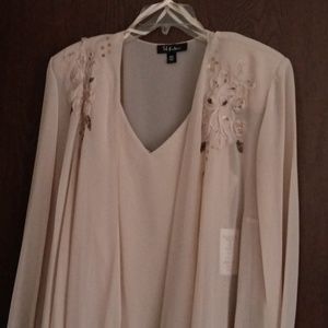 Women's sand sleeveless dress with sheer jacket, fishtail bottom.